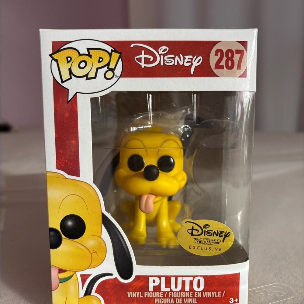 Disney Exclusive Pluto Vinyl Figure in Yellow
